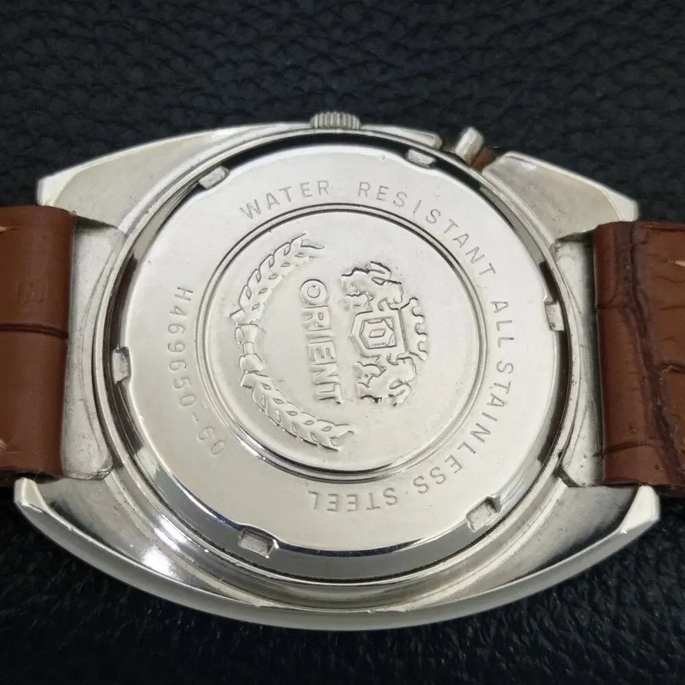 Vintage 1982 Orient Automatic Mens Silver Watch W/daydate & Gold accents